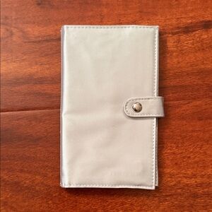 SHISEIDO Silver Wallet with Snap Closure